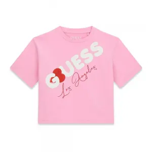 Розова къса тениска за момиче с бял надпис Guess и червено сърце