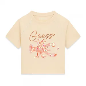 Бежова тениска за момиче с бродиран надпис Guess и омар с пайети